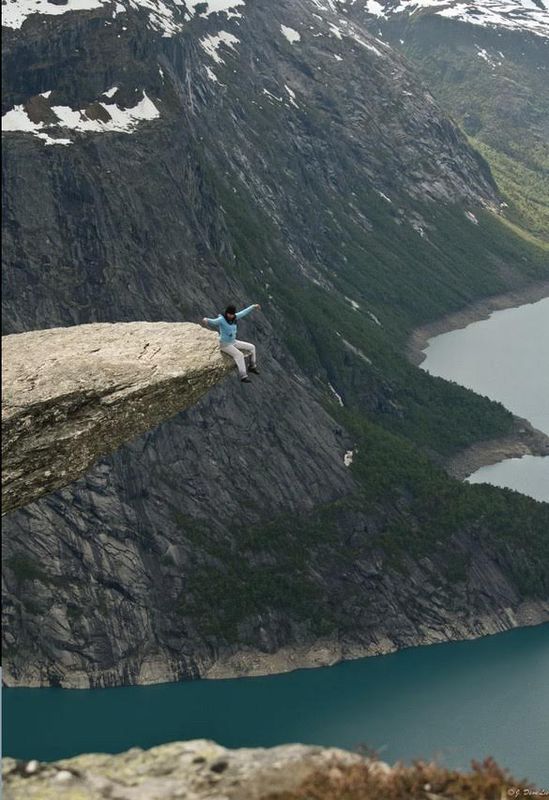 Sitting on the Trolltonga Rock in Norway...