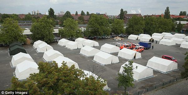 Tent city being constructed near Berlin. If this w...