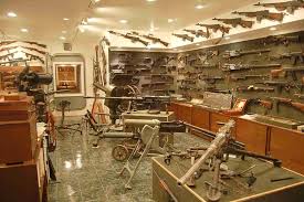 Heston's basement gun vault. That's a Ma Deuce on ...