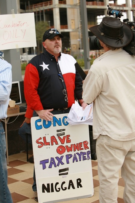 Actual sign held by Tea Party founder!...