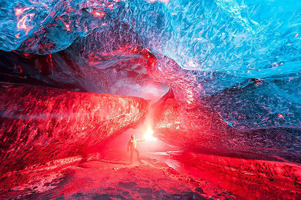Ice cave, illuminated by a torch...