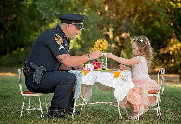 This two-year-old threw a tea party for the police...