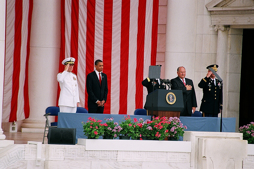 Obama not  respecting the National Anthem and US f...