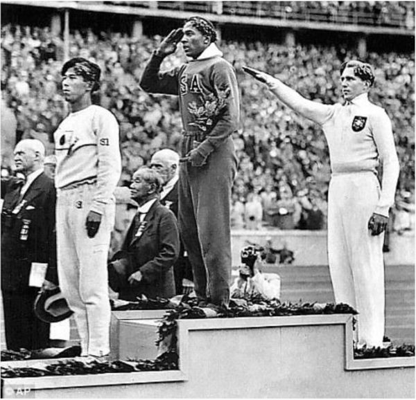 This is Jesse Owens saluting the American Flag aft...