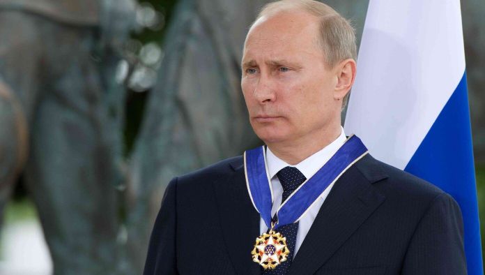 Putin Awards Self Medal Of Freedom For Dropping Ga...