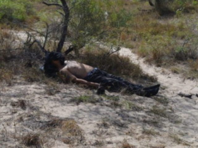 Body of dead migrant, Brooks County, TX....