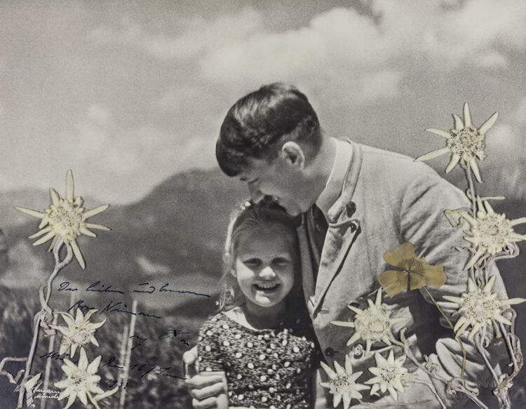 Adolf Hitler with his arm around a Jewish girl nam...
