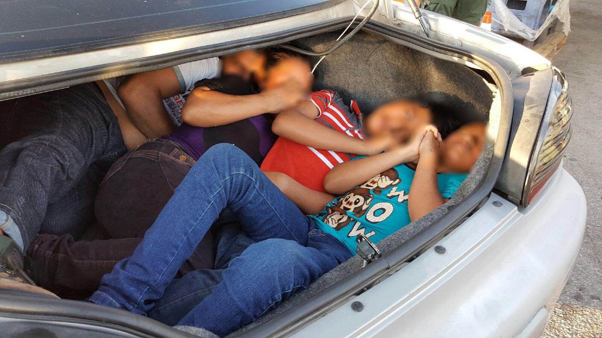Bodies of young illegals found suffocated in car t...