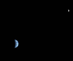 This photo of earth and moon was taken by the High...